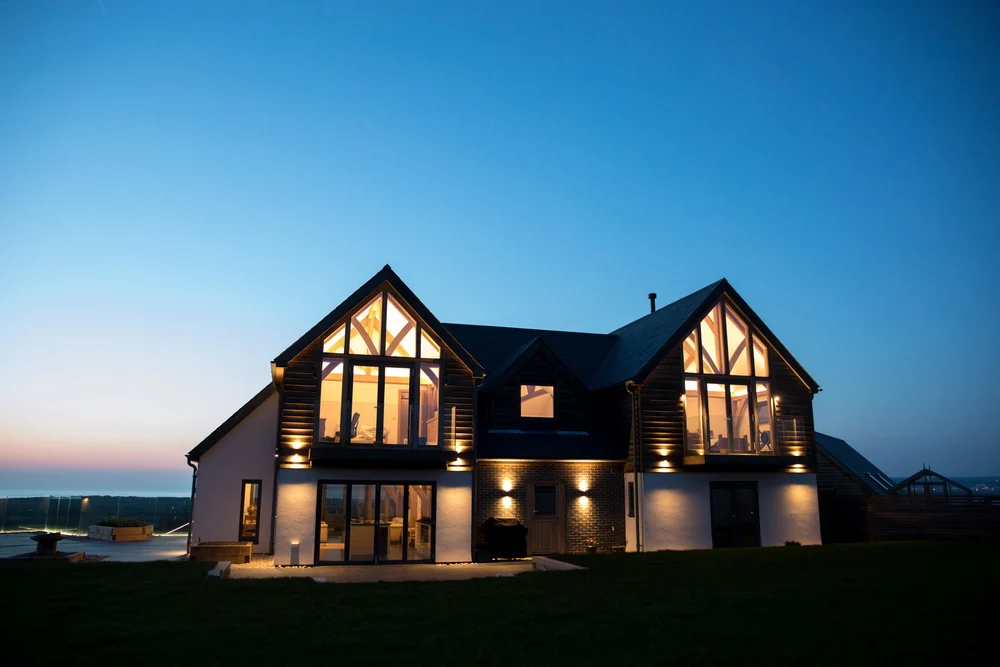 Green oak-framed new build with bespoke LED lighting